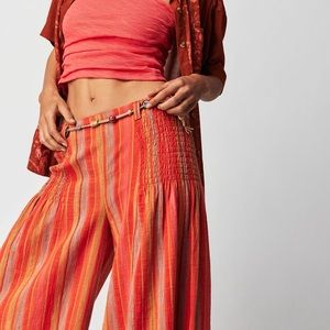 Free People Wide-Leg Pants in Red and Orange with Bohemian Flair